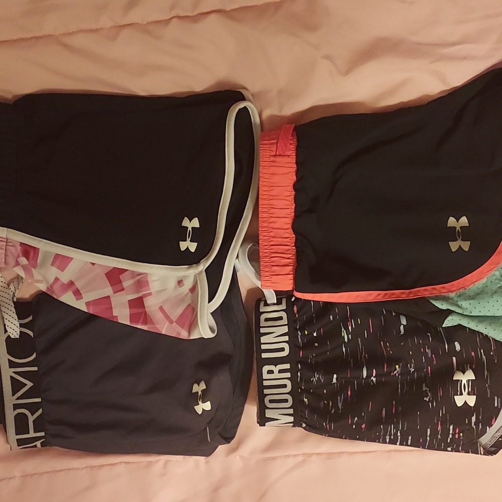 4 pairs of girls' size 8 Under Armour shorts